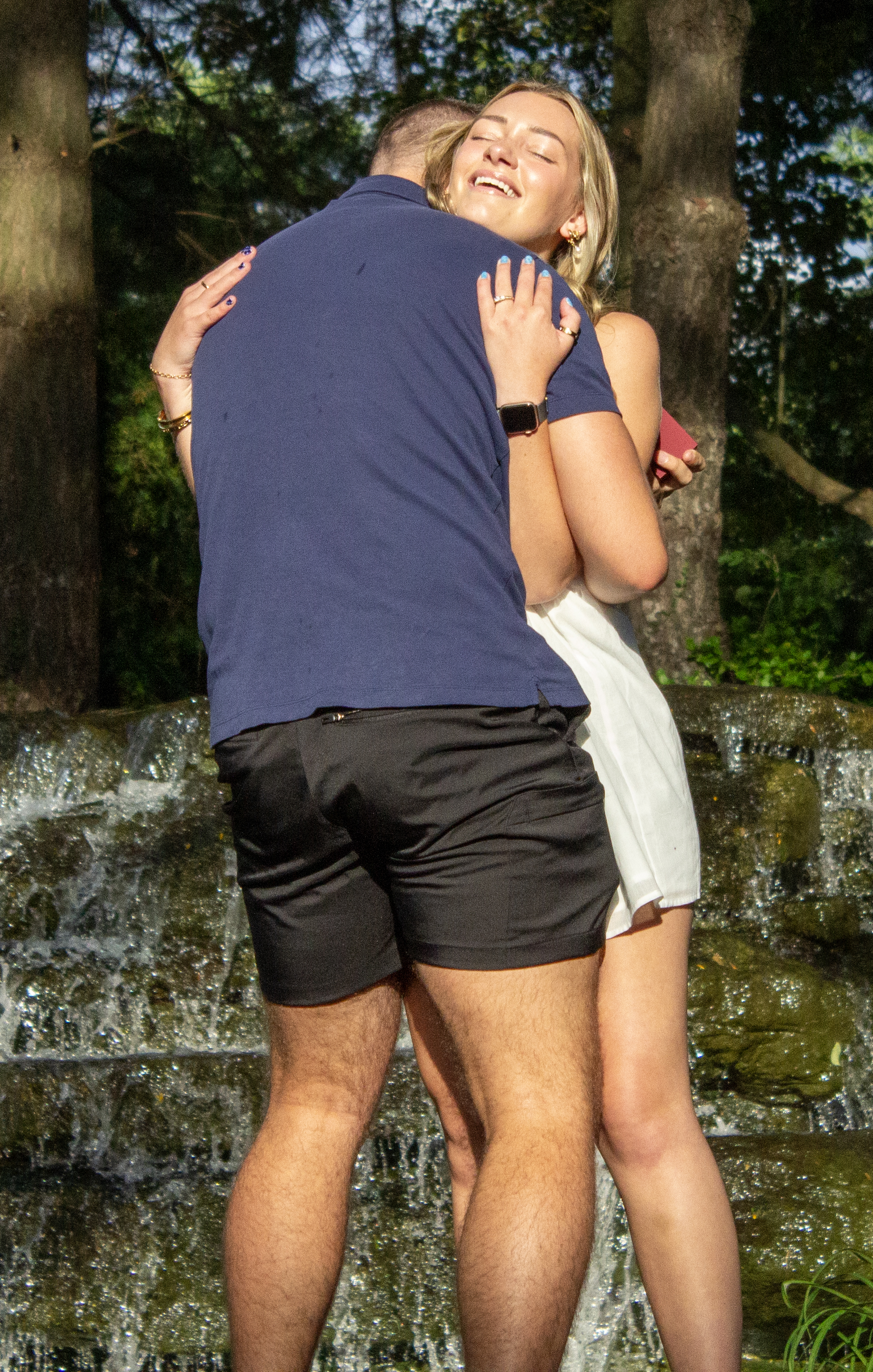 Alex & Morgan hug smile